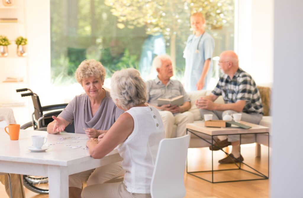 A group of assisted living residents enjoying communal time together.